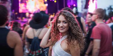 Happy woman at a concert