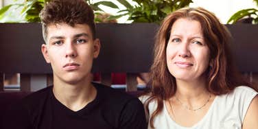 man sitting next to his narcissistic mother