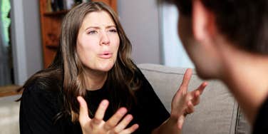 Couple displaying the biggest predictor of divorce. 