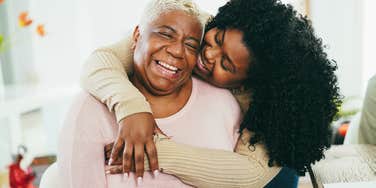adult woman hugging her mother