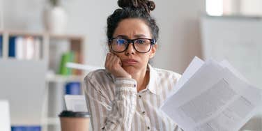 Woman about to clap back at her toxic co-worker