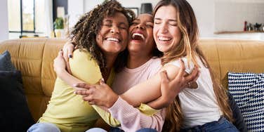 friends hugging and celebrating one big thing