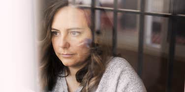 woman grieving about coworker friend's death 