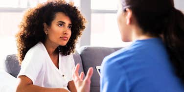 People having a conversation in a polarized world that won't stop fighting. 
