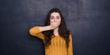 Young brunette trying a conversational tool for shy people