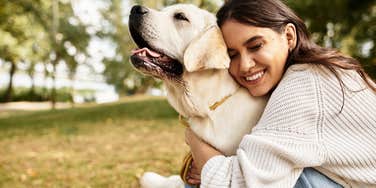 woman and her pet dog