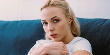 stressed woman carrying a big emotional load
