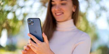 woman with iphone made in the usa