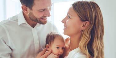 parents deciding on a name for their newborn baby