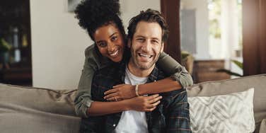 happy couple cuddling 