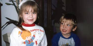 Young girl growing up with little brother. 