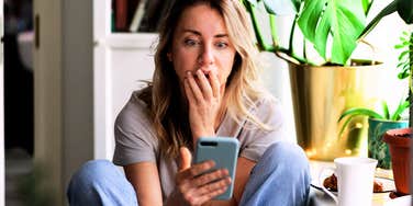 Woman from Canada watching America in horror.