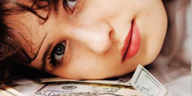 Woman making financial mistakes that she will regret in her thirties and forties. 