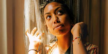 Spiritually gifted woman noticing little things around her. 