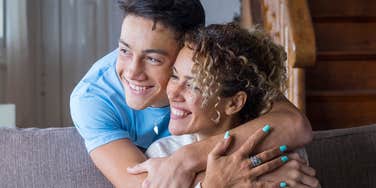 mom hugging one of her bonus kids