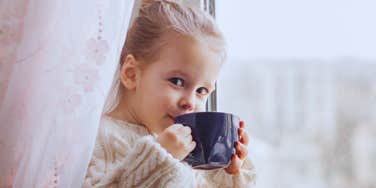 little girl sipping on coffee