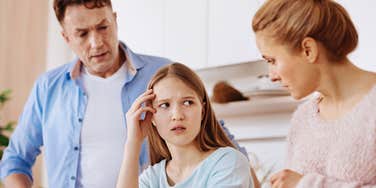 frugal parents scolding child for wanting to spend their money