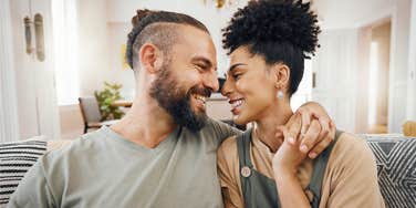 happy couple in love smiling at each other