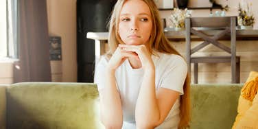 young gen z woman looking anxious