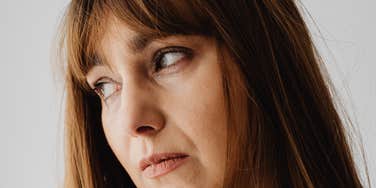 Woman is afraid of being alone.