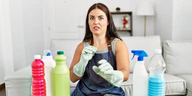 woman cleaning avoiding ways accidentally eat mold home