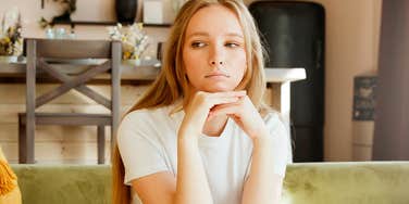 sad young woman who feels like a burden