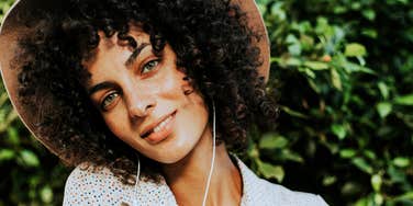 Woman trying to avoid catching feelings too soon in relationship.