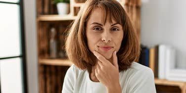 intelligent woman thinking about things she secretly dislikes doing