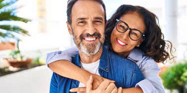 happy couple woman hugging man smiling