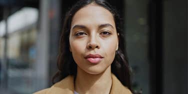 serious high iq businesswoman looking annoyed