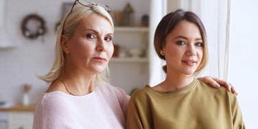 gen z woman and boomer woman looking annoyed side by side