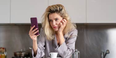 Woman in pajamas annoyed that woman said birthrates are low because women don't wear lingerie