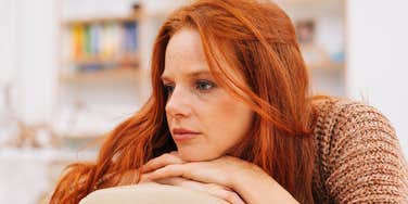 emotionally broken woman looking despondent