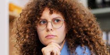 Woman who is totally done with her job. 