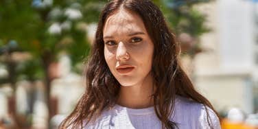 good young woman feeling weak for what she said