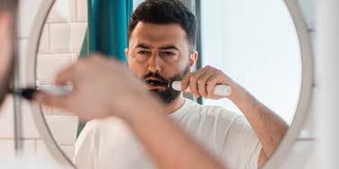 husband calls wife mean expecting him brush teeth