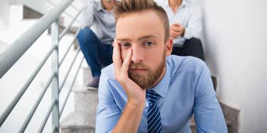 white-collar worker wishes he had a blue-collar job