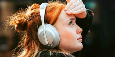 Person listening to music. 
