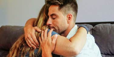 Man defusing wife's anger. 