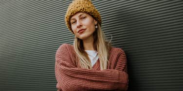 woman with arms crossed offended by what used to be seen as a compliment