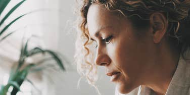 sad woman who has been through a lot in life