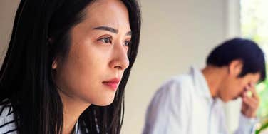 Woman believing divorce myths. 