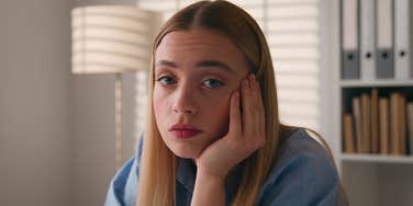 sad depressed young woman who isnt close with her parents anymore