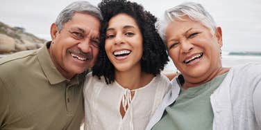 adult woman hanging out with her parents 