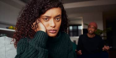 woman who cant stand her husband looking annoyed
