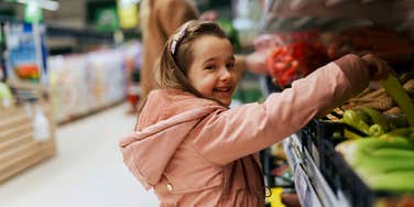 kid getting free groceries because of good grades