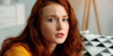 emotionally exhausted woman looking stressed