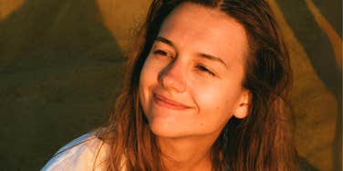 Woman who restored her soul by embracing off-grid beach life.