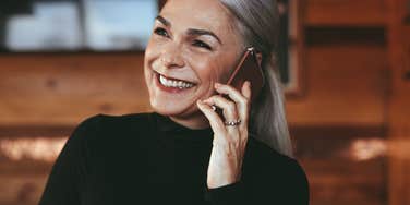 Mom talking on the phone reducing adult child's stress