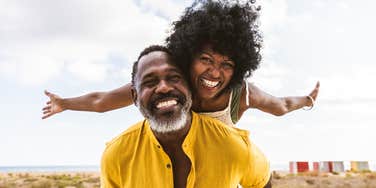 happy couple effortlessly having fun in their relationship